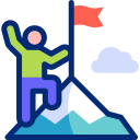 Image of person putting a red flag on the top of a mountain