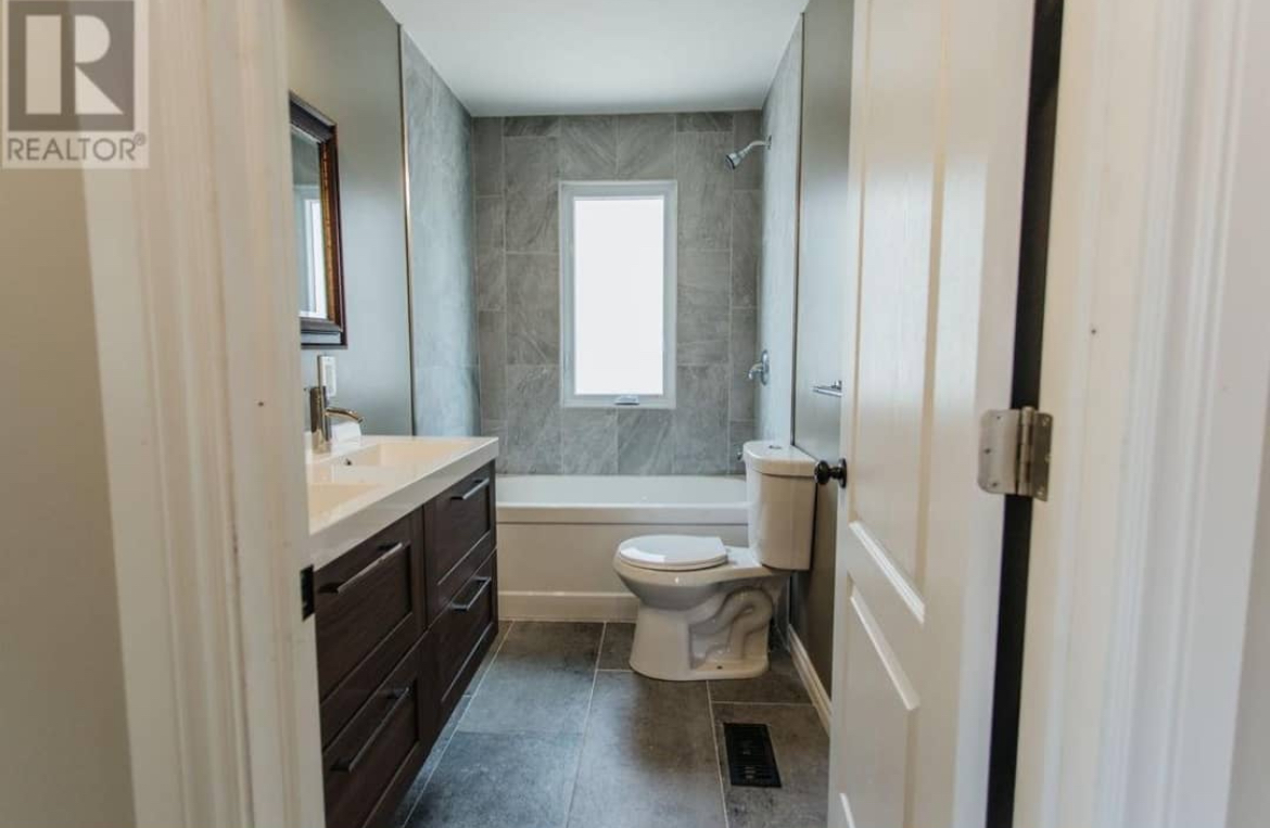 Bathroom Tile, New Tub, New Bathroom Vanity, Toilet Replacement and Mirror Installatiion