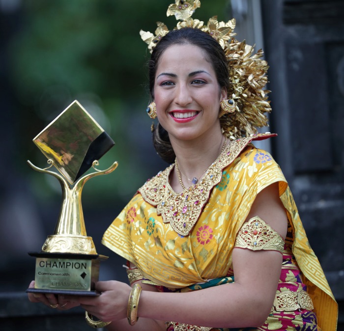Aravane Rezai in tradtional outfit with the trophy