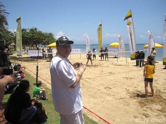 Barry Wood watches Players Beach Volleyball Game