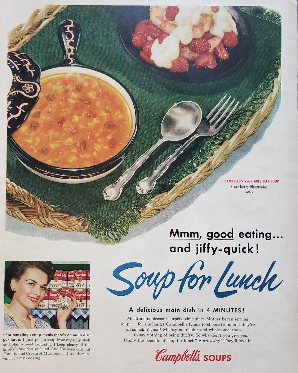 Nostalgic 1950s Campbell&apos;s Soup lunch, featuring vintage advertising likely by John C Howard.
