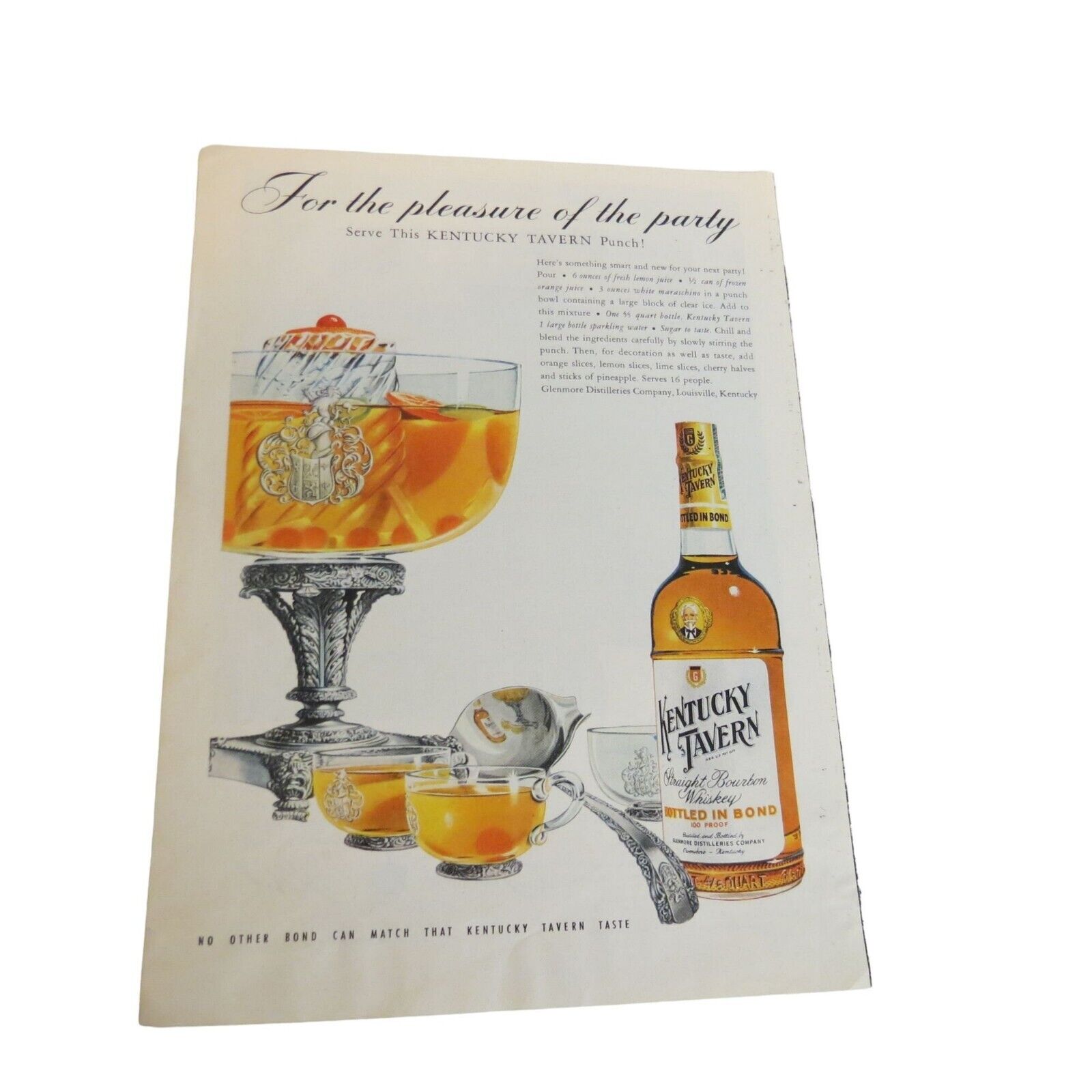 Vintage ad for Kentucky Tavern bourbon showcasing a decorative punchbowl and bottle. Likely Illustrated by John C Howard.