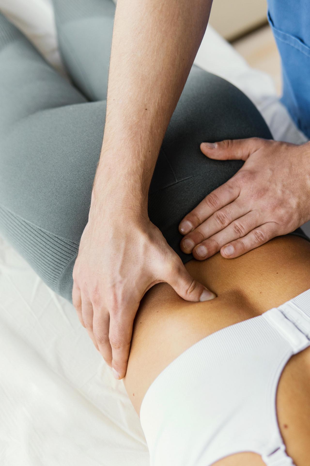 Therapist performing osteopath at V-Health Rehab Clinic