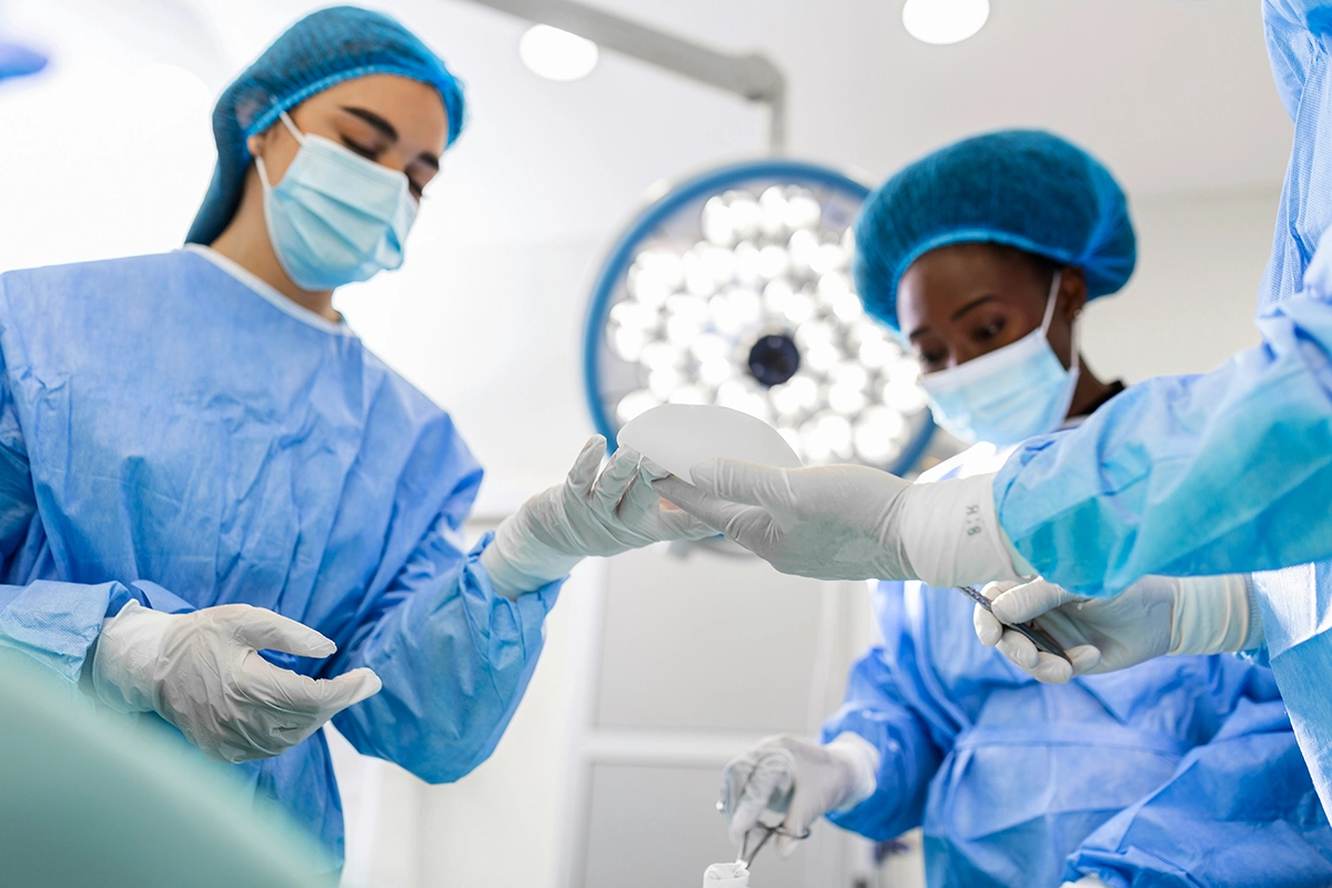 doctor performing nasal surgery