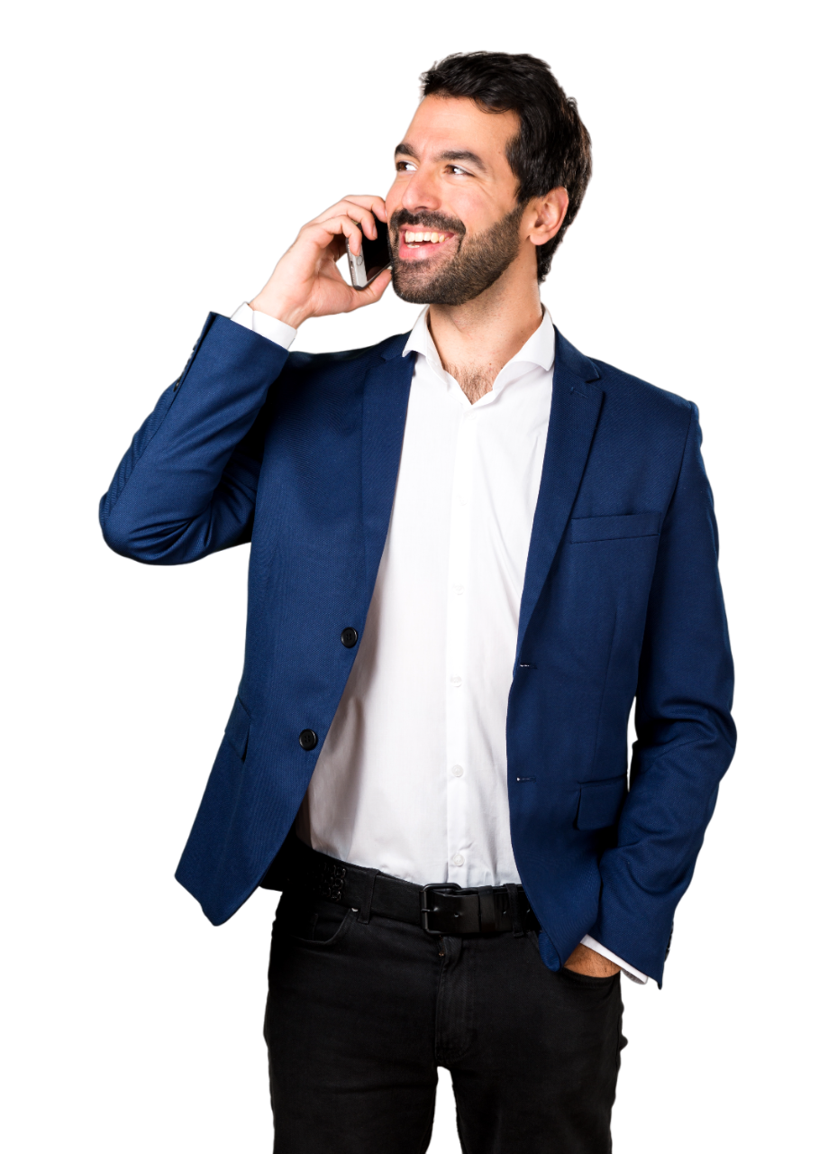 man in a blue suit coat holding a cell phone to his ear