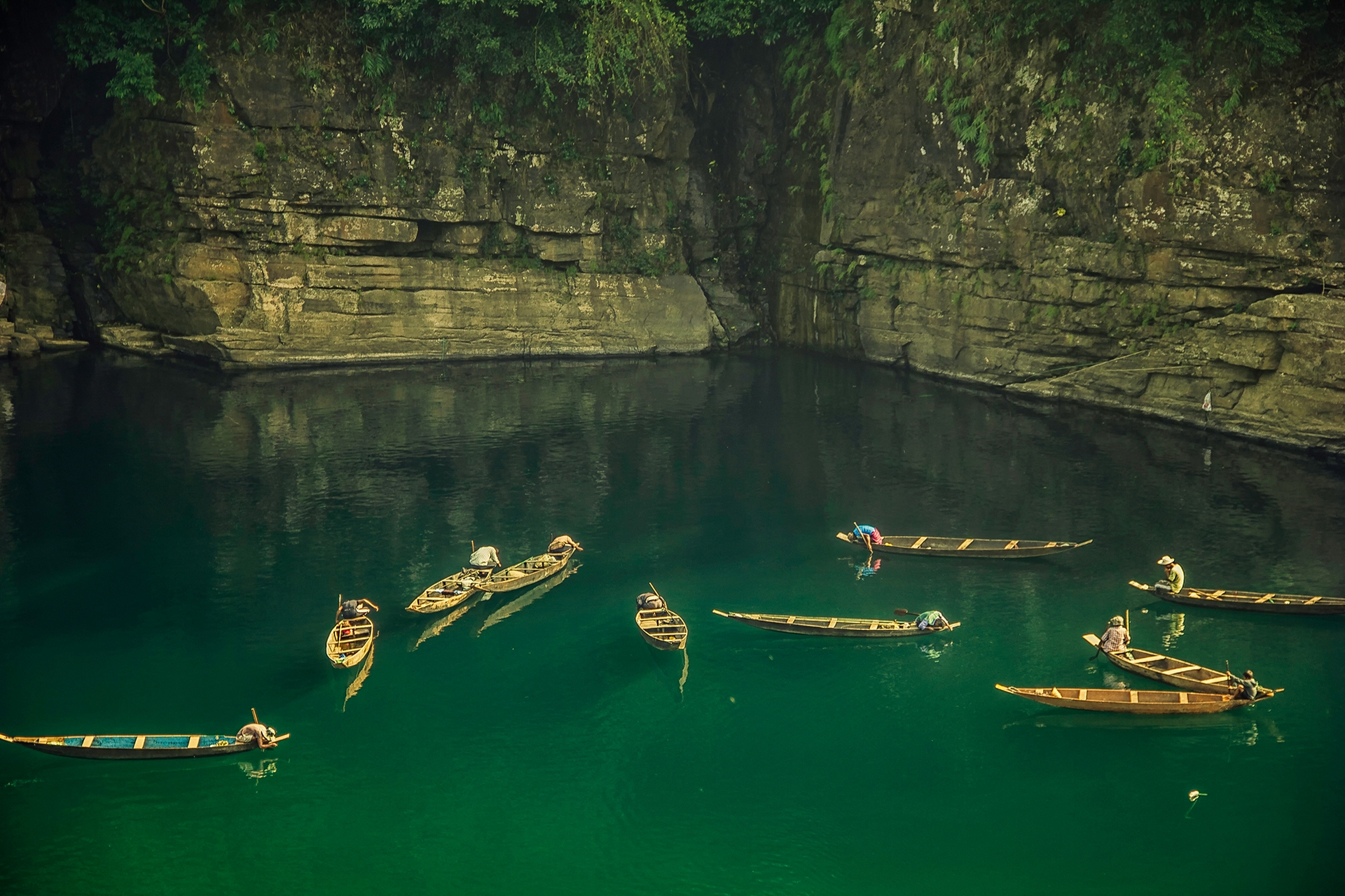 fishermen in dawki river of meghalaya