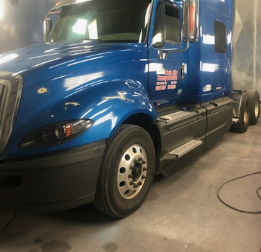 blue truck damaged