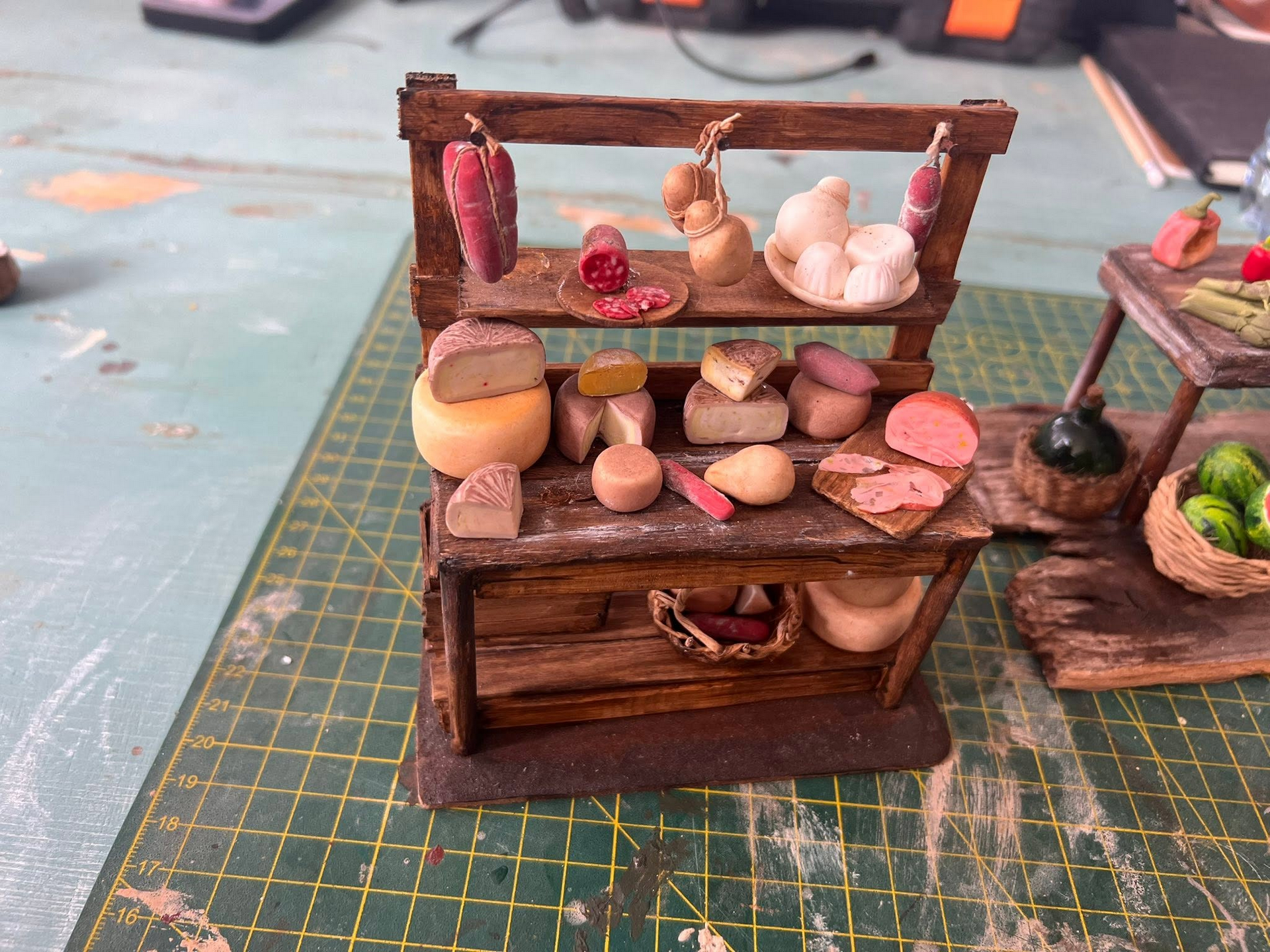 Stand I Presepi di Dario con presepe, ulivo e scenografie in miniatura